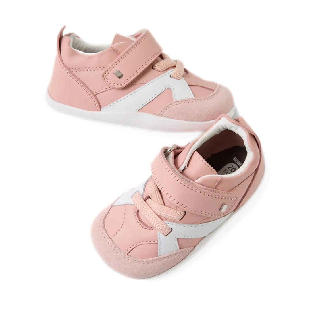 The Bobux Xplorer XP Chase Ballet Pink First Walker Crawler features two adorable pink baby sneakers with white soles and side accents, pink laces, and a convenient Velcro strap across the top. Displayed on a white background, these pre walker shoes are a