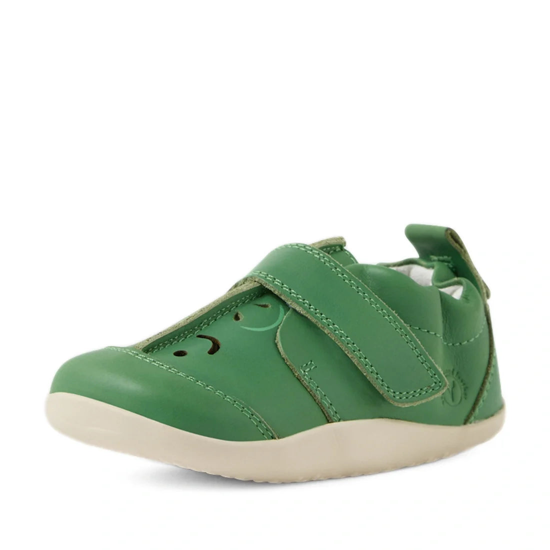 Introducing the Bobux XP Explorer Little Sprouts Apple Pomme First Walker Green—a stylish toddler shoe featuring a vibrant green upper, a white sole, Velcro strap, and an adorable face design on the toe. Shown from a front-side angle, these shoes are perf