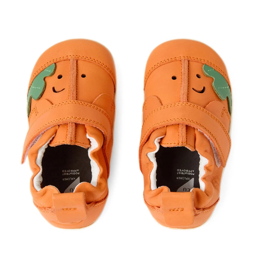 The Bobux XP Explorer Little Sprouts Carrot Top First Walker Orange shoes are a delightful pair of children’s pre-walker leather shoes featuring smiling faces and green leaf details on the orange toes. Designed with Velcro straps, a flexible sole to suppo