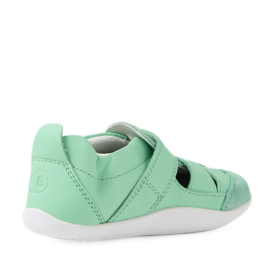 Introducing the Bobux XP Explorer Maris First Walker Sandal Jelly Mint in a fresh mint green shade, inspired by classic fisherman sandals with cutout sides, a closed toe, and a soft white sole. Shown from a rear side angle, these stylish pre-walker shoes 