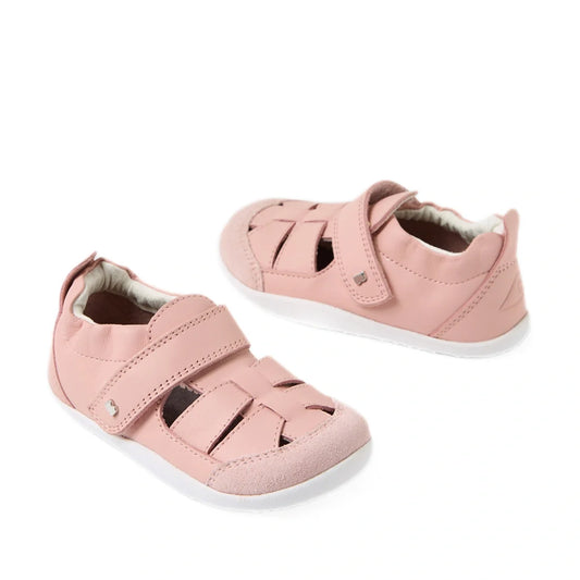 Introducing the Bobux XP Explorer Maris First Walker Sandal in Pink—a stylish pair of toddler fisherman sandals with Velcro straps and white soles, pictured on a white background and designed to be perfect first walking shoes for little ones.