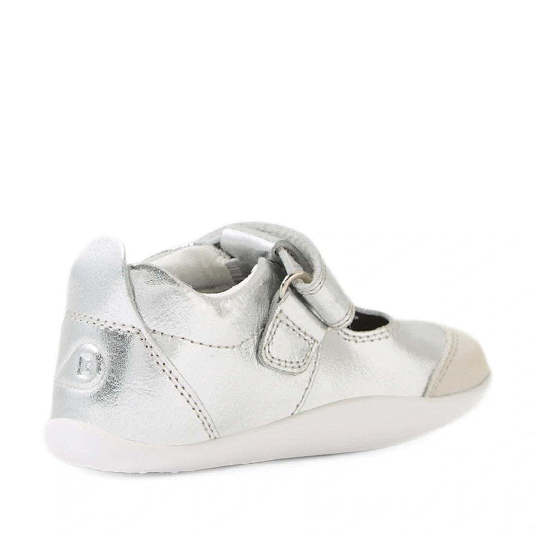 The Bobux XP Explorer Rue First Walker Sandal in silver, featuring a white sole, velcro strap, and reinforced toe—perfect as first walking or pre-walker shoes—is shown from the back against a white background., 9420074851192, 9420074851208, 9420074851215