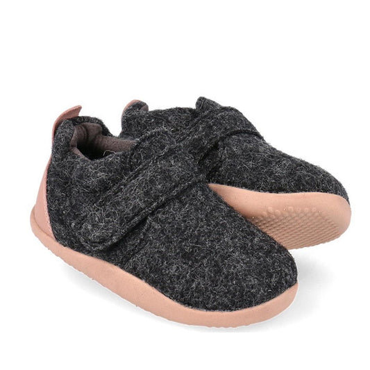 The Bobux Xplorer XP Marvel Felt Charcoal Pink baby shoes, featuring dark gray natural felt, light pink flexible soles, a scuff-resistant toe cap, and a Velcro strap, are shown side by side on a white background.