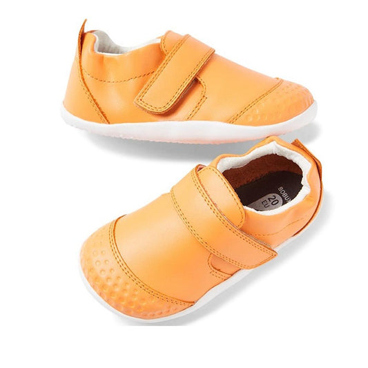 Bobux Xplorer Go Apricot Crush First Walker 501041: a cheerful orange toddler shoe with white soles, toe protection, and Velcro strap.  ksnz