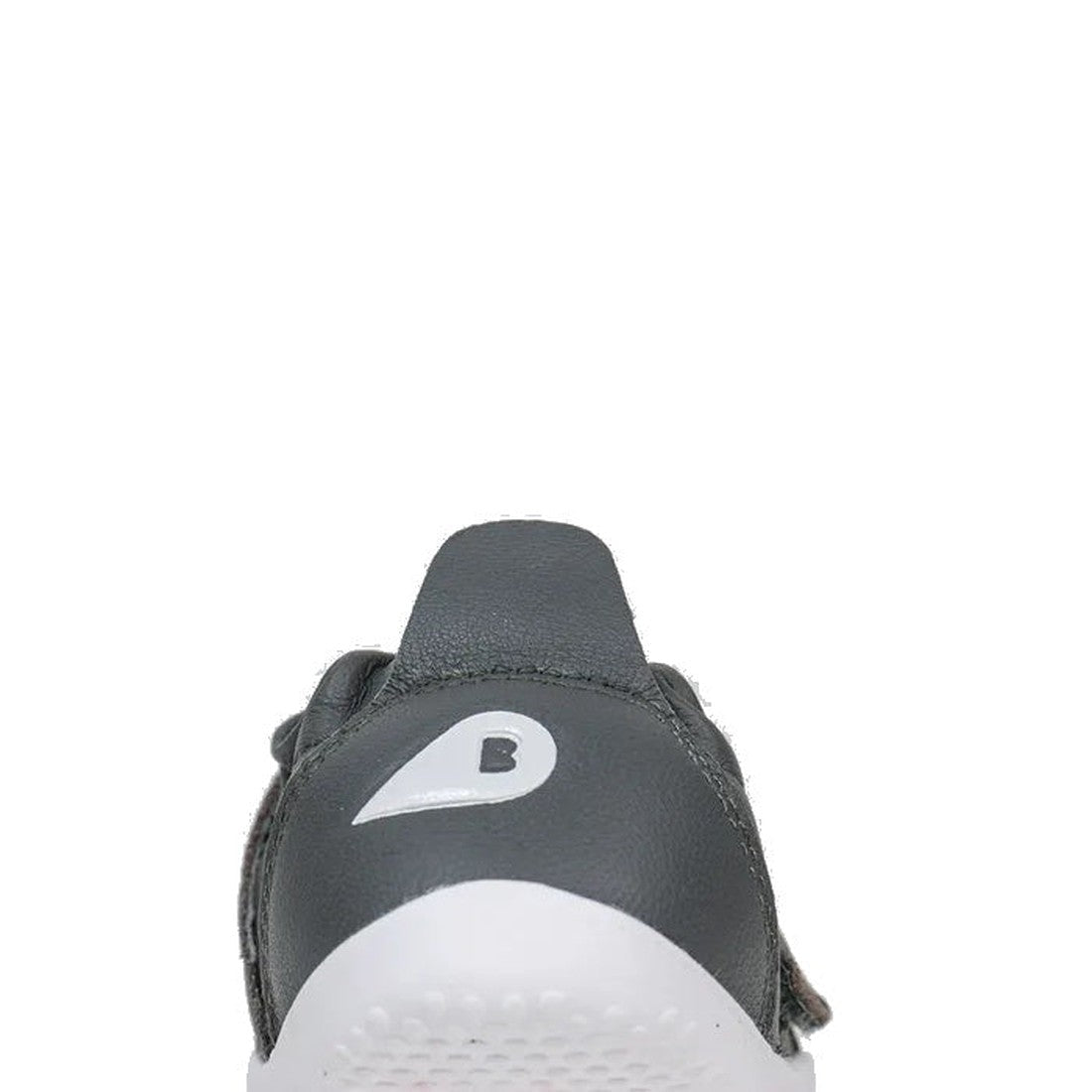 A close-up rear view of the Bobux Xplorer XP Go Smoke Grey First Walker Crawler 501002B, showing a dark gray premium leather baby shoe with a white sole and white B logo on the heel tab, designed for comfort and style against a plain white background., 94