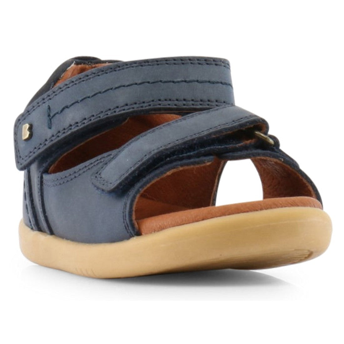 A close-up of the Bobux IW Iwalk Driftwood Sandal Navy Open Toe 633601A, featuring adjustable straps and a tan rubber sole for young children. This comfortable summer sandal is shown against a white background., 9420062048023, 9420062048030, 9420062048047