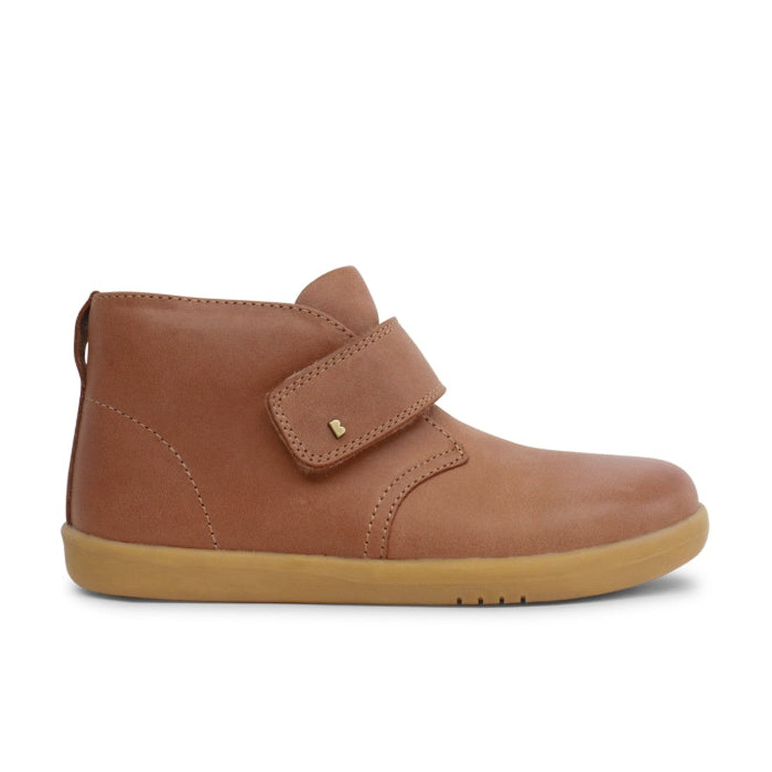 The Bobux Kid+ Desert Boot Caramel 830305Z is a brown leather unisex children’s high-top boot with a tan rubber sole and wide hook-and-loop strap, shown in side profile against a white background., 9420068516861, 9420075719682, 9420075719699, 942006851689
