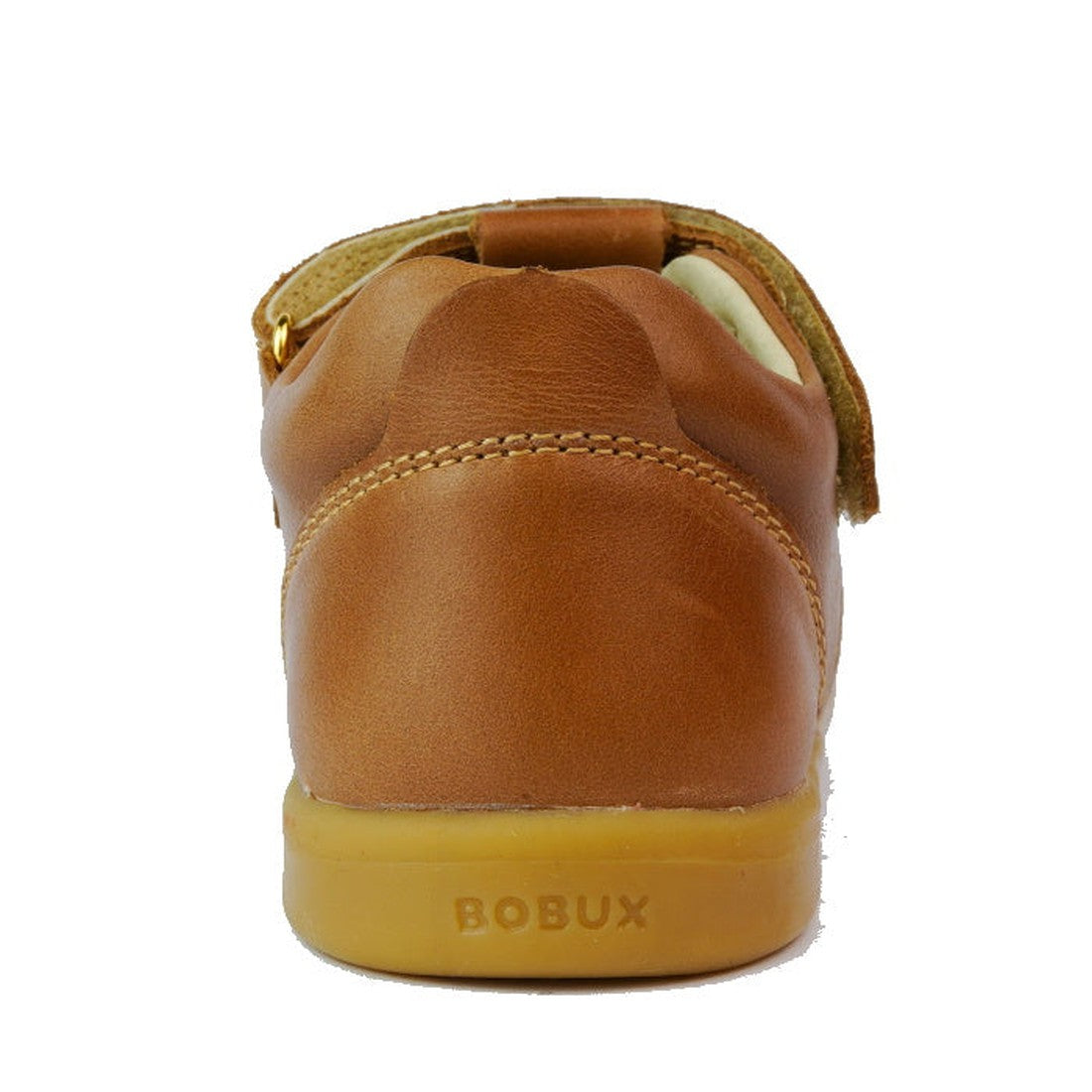 A close-up rear view of the Bobux Kids Plus KP Louise Caramel Tan T-Bar shoe shows its brown leather, rubber sole, embossed BOBUX branding on the heel, visible stitching, and closed back for a timeless kids’ style., 9420068521483, 9420068521490, 942006852