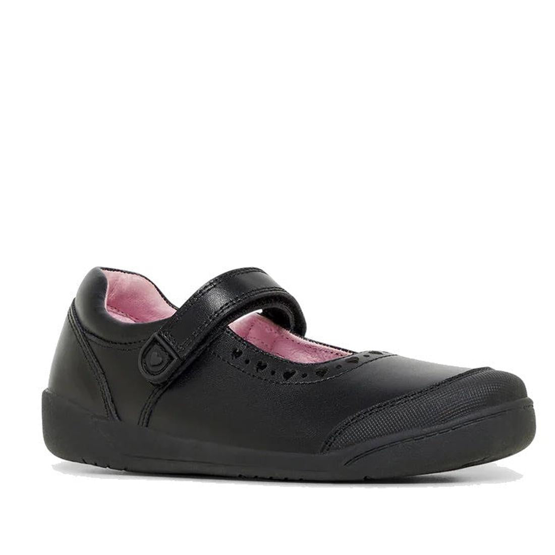 The Clarks Bianca D Fit Narrow Width Velcro Leather School Shoes Mary Jane features a black leather upper, pink inner lining, memory foam insole, decorative edge perforations, and is displayed against a white background.