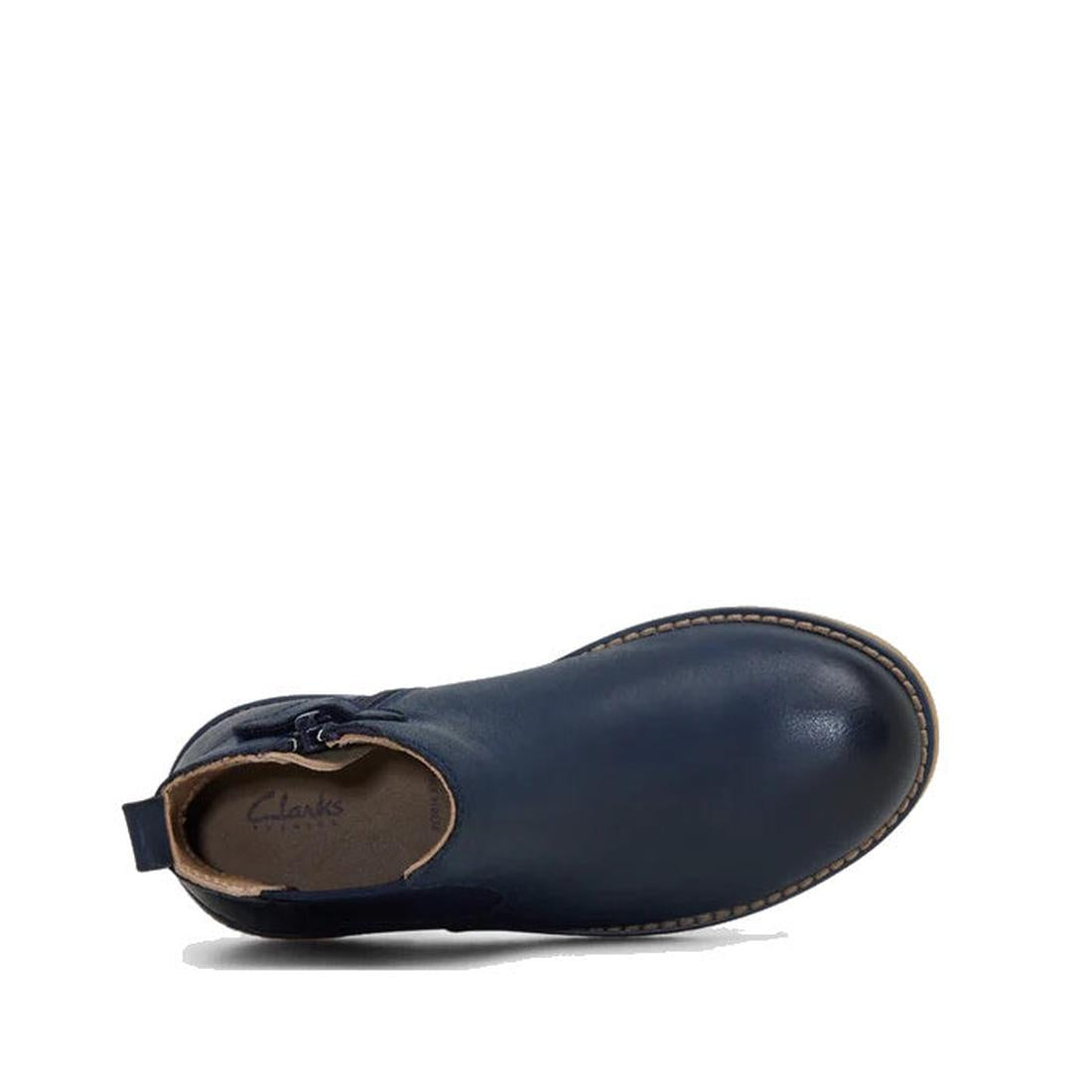 Top view of the Clarks Kids Chelsea II Youths Leather Boot in navy leather, featuring a side zipper, tan stitching around the sole, and branded insole. The boot stands out against a white background., 9336078964427, 9336078964434, 9336078964441, 933607896