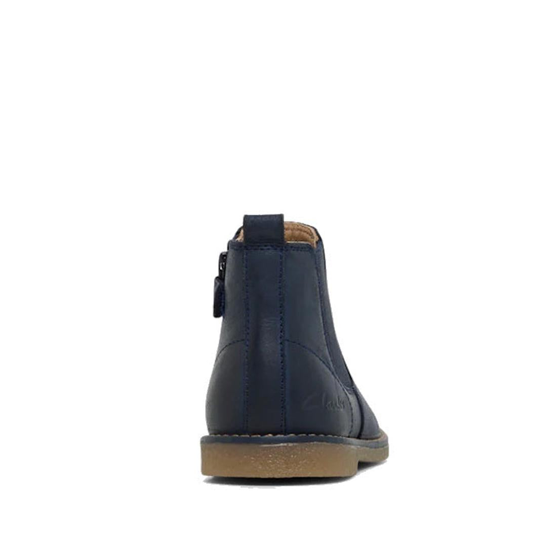 Clarks Kids Chelsea II Youths Leather Boot in navy leather, shown from the back with a brown sole, visible stitching, and a heel pull tab. Made from genuine leather and displayed on a white background., 9336078964427, 9336078964434, 9336078964441, 9336078