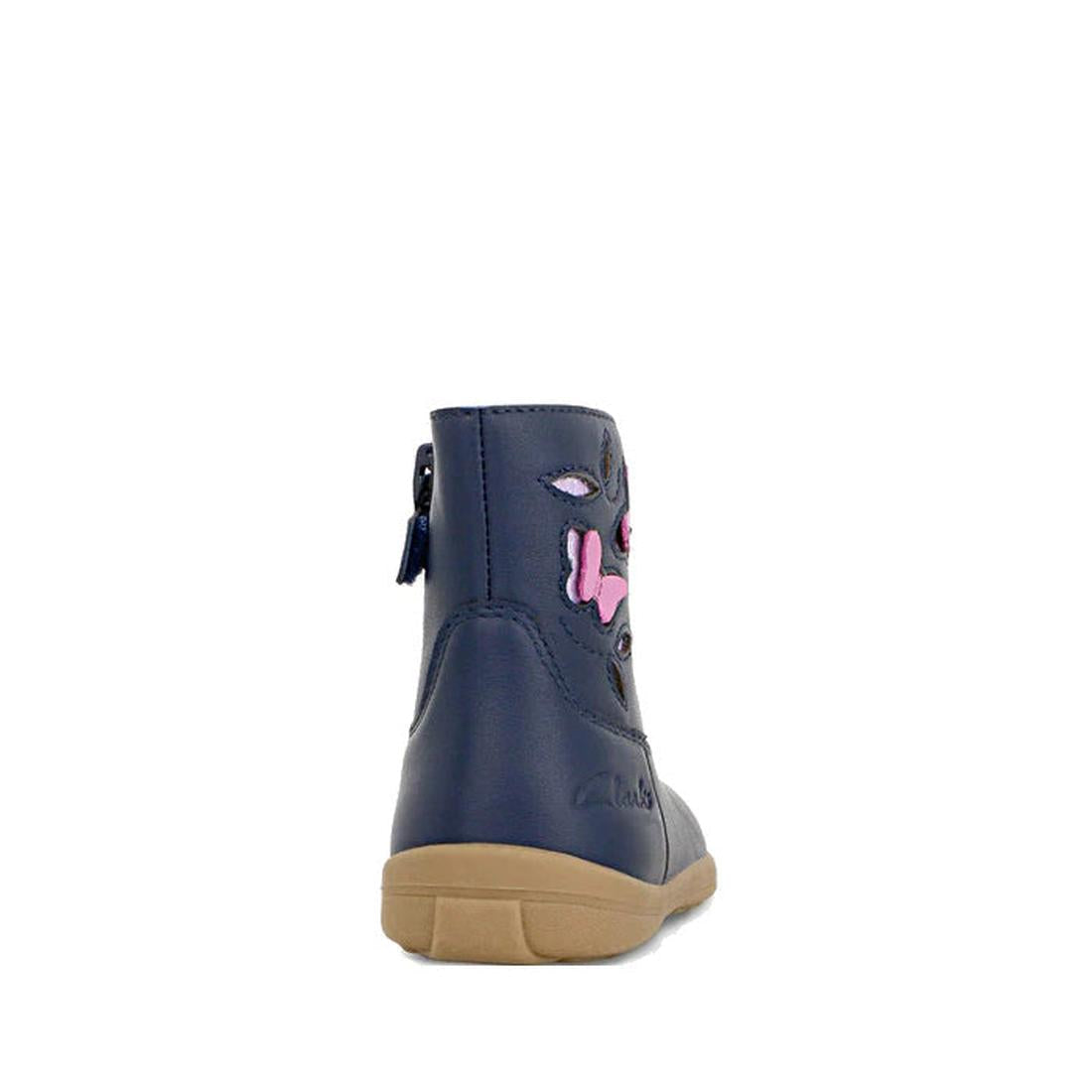 The Clarks Kids Marcela Leather Boot in navy features a leather upper, tan sole, and back zipper. A pink and gray embroidered animal face accents the heel. This girls’ boot is E width (average) and shown from the back., 36303, 9336078981691, 9336078981714
