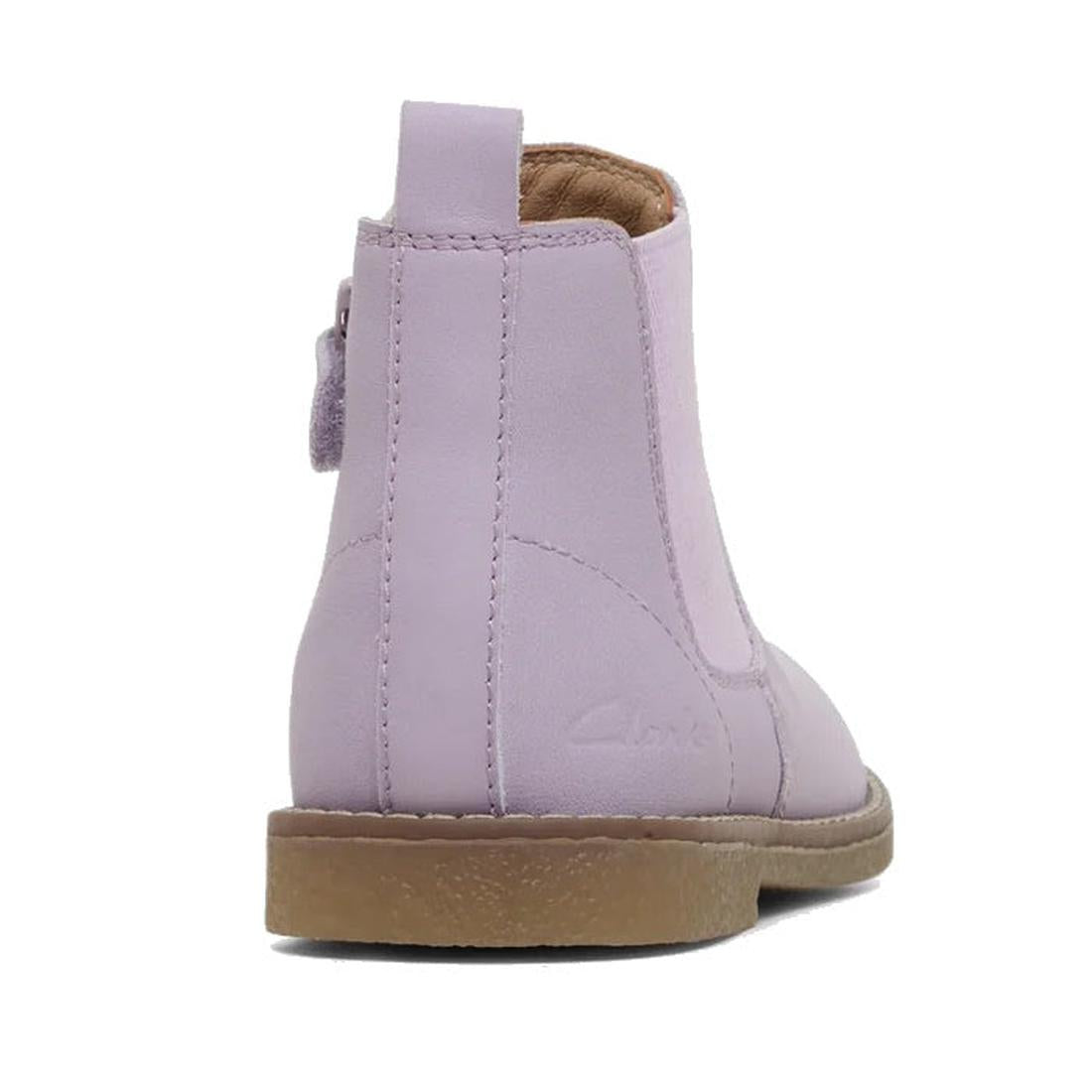The Clarks Kids Chelsea II Youths Leather Boot in lilac features genuine leather, a tan rubber sole, visible stitching, a heel pull tab, and classic Chelsea styling. Shown from the back right side., 9336078964304, 9336078964311, 9336078964328, 93360789643