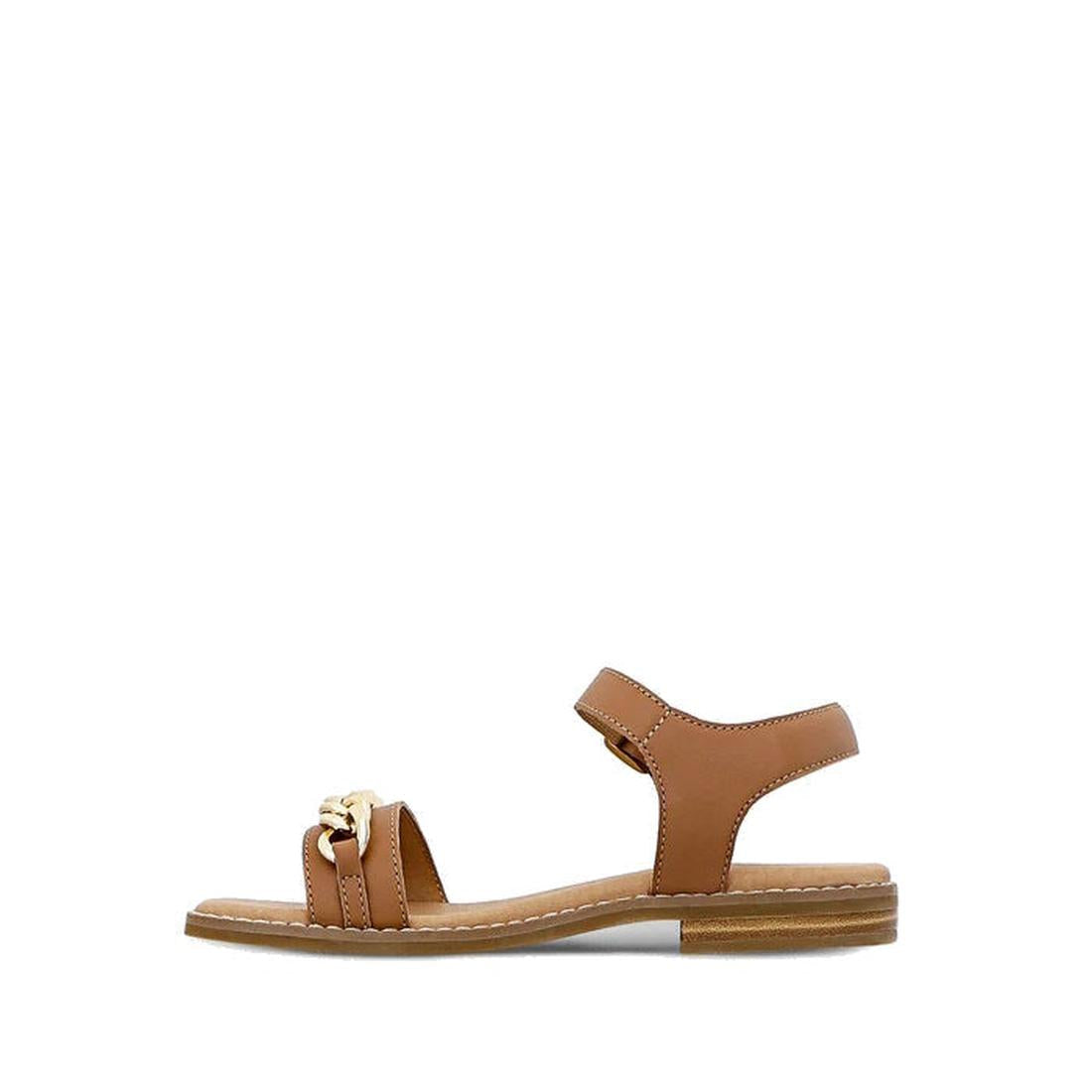 The Clarks Girls Amy Tan Leather Sandal Special Occasion features an adjustable ankle strap, low wooden heel, white stitching, and a gold chain detail on the front strap, shown against a plain white background., 40498, 40499, 40500, 40501, 40502, 40503, 9