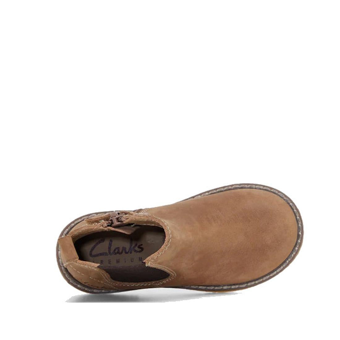 Top view of Clarks Chelsea II Jnr Tan Toddlers Leather Boot in tan leather with visible sole stitching and side zipper, Clarks-branded insole, and Puddle Proof technology. Displayed on a white background., 9336078263193, 9336078263216, 9336078263230, 9336