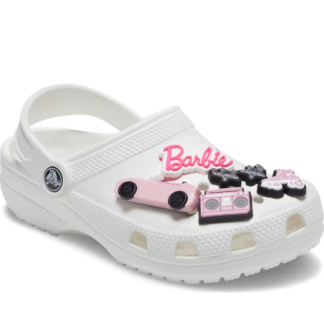 The Crocs Jibbitz 5 Pack - Barbie New Style features Barbie-themed charms for white Crocs, including a pink and black car, butterfly, boombox, and "Barbie" in script., 196265706709