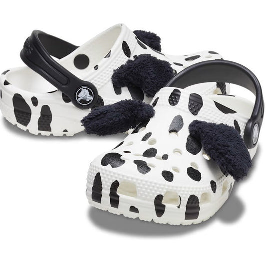 Crocs Kids Toddlers Classic Clog I Am Dalmatian—white clogs with black spots, cushioned sole, playful fuzzy ears, secure heel strap.  ksnz