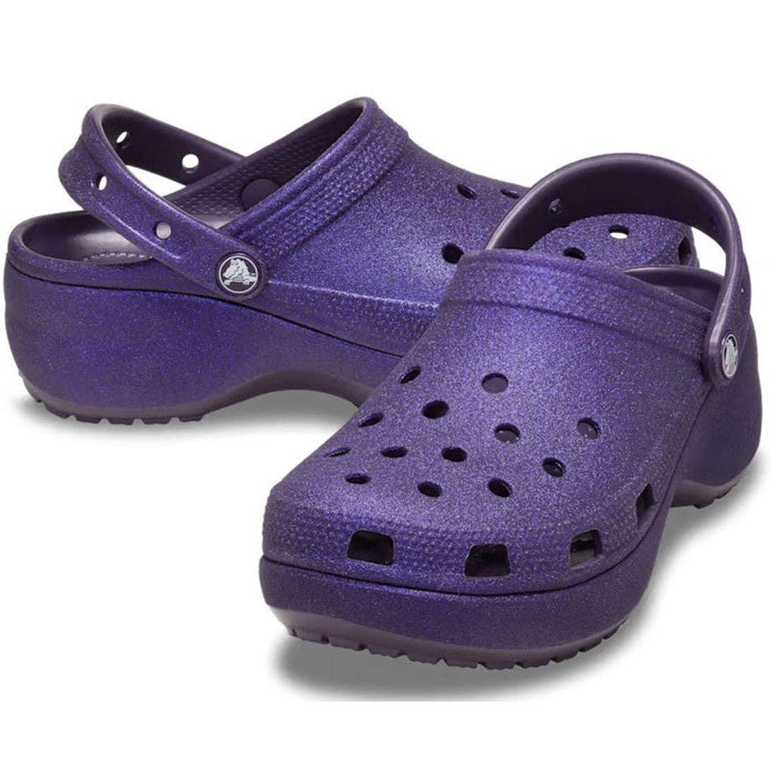 Crocs Women's Classic Glitter Platform Clog in Dark Iris Purple, with sparkle finish, comfy soles, vent holes, and easy heel straps.  ksnz