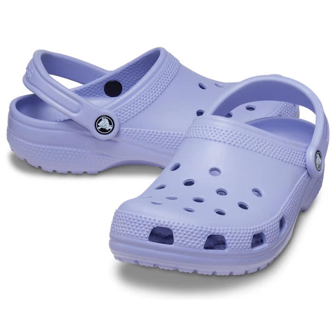 A pair of Crocs - Classic Clog Mystic Purple Adults womens & mens with ventilation holes and heel straps, displayed on a white background.