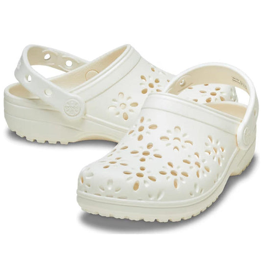 Crocs Classic Floral Cut Outs Clog for adults in chalk off white with comfy cushioned sole, floral cut-outs, and easy back strap closure.  ksnz