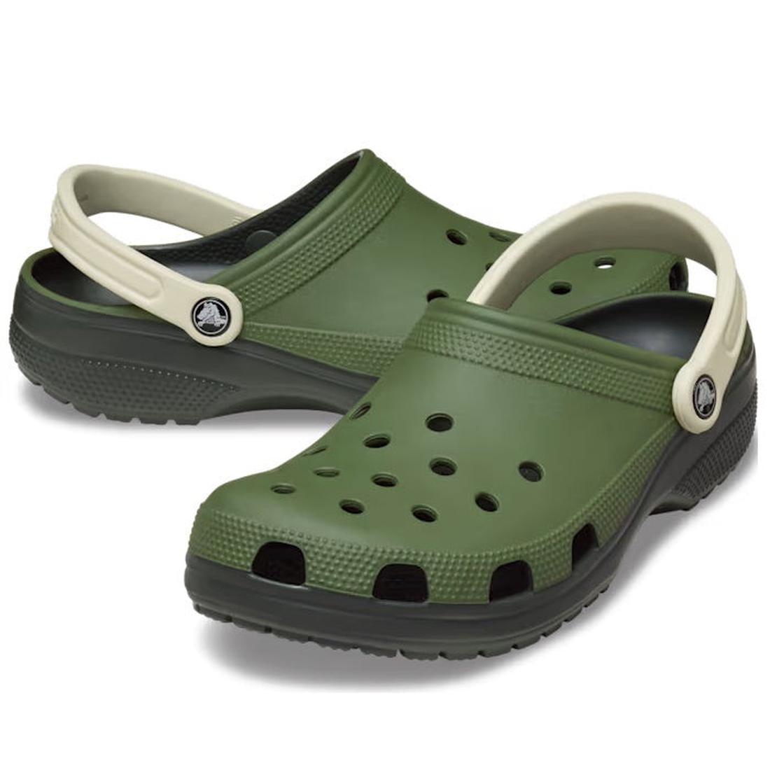The Crocs Classic Retro Sport Clog in Khaki Army Green for adults features black soles, white straps, and ventilation holes on the top and sides for signature Crocs comfort.