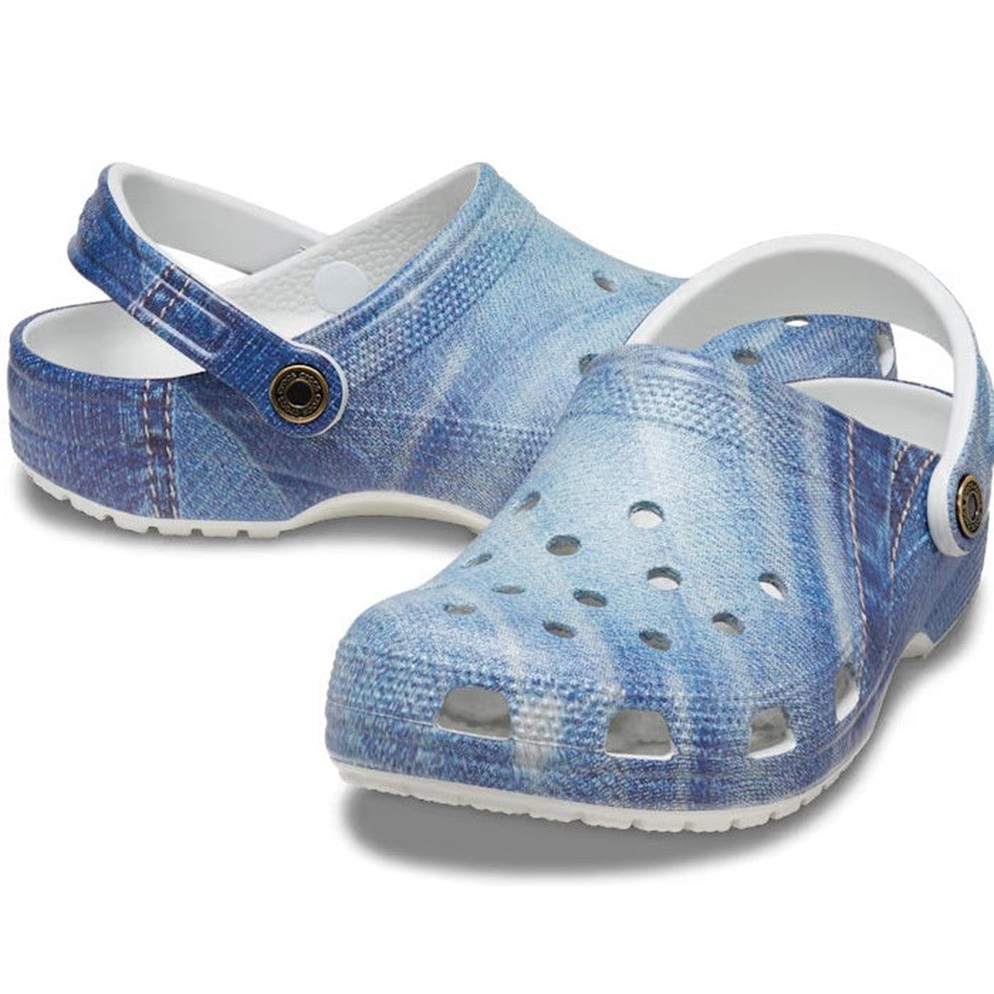 The Crocs - Classic Denim Clog Moonlight Blue Adults is a comfy slip-on with a soft blue denim look, grippy sole, and secure heel strap.  ksnz
