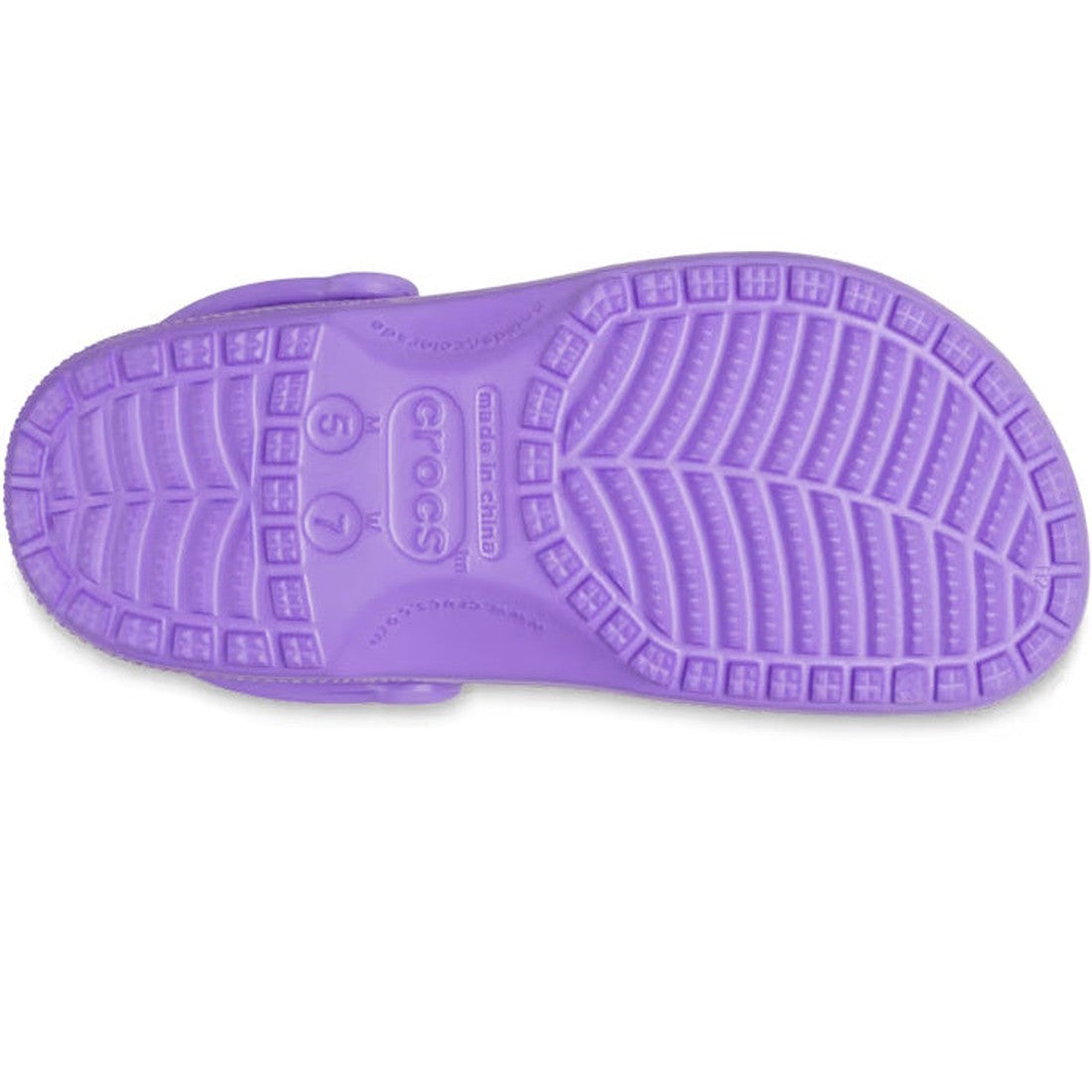 The image shows the sole of the Crocs - Classic Clog Galaxy Purple Adults womens & mens, viewed from beneath, highlighting its textured tread pattern and visible size markings., 196265646166, 196265646173, 196265646180, 196265646197, 196265646203, 1962656