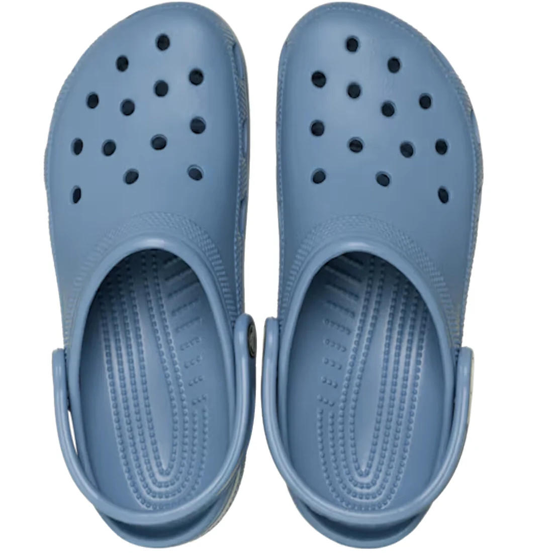 A pair of Crocs Classic Clog Astro Blue Adults Unisex, shown from above on a white background, features ventilation holes across the top and an adjustable heel strap—ideal for those looking for a blend of style and comfort.