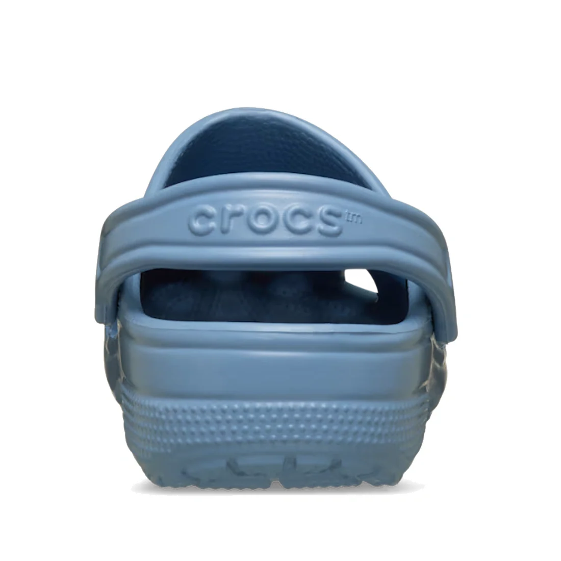 A rear view of a single Crocs Classic Clog Astro Blue Adults Unisex shoe with the heel strap raised, displaying the Crocs logo on the strap.