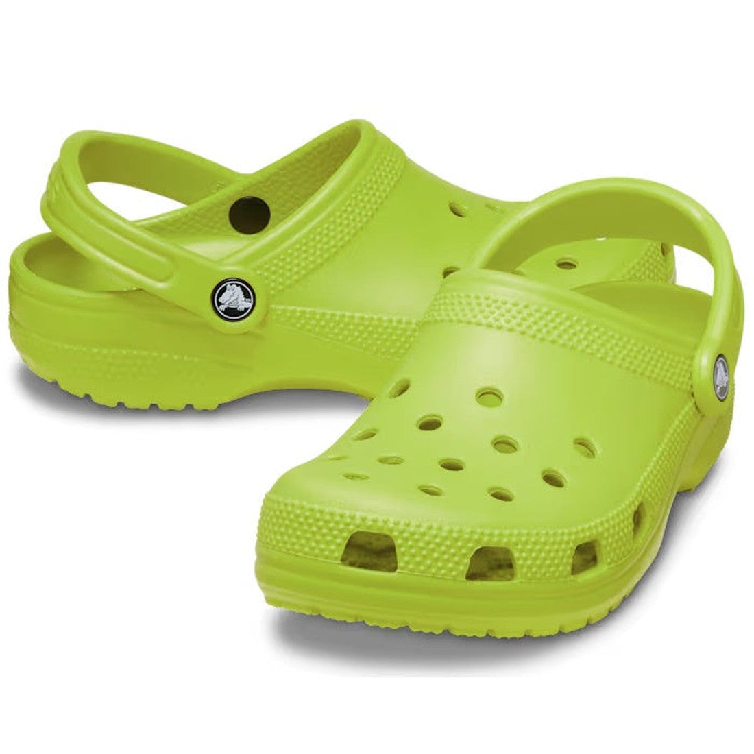 A pair of Crocs - Classic Clog Kiwi Green Adults Womens & Mens, featuring top ventilation holes and adjustable heel straps, shown against a white background.