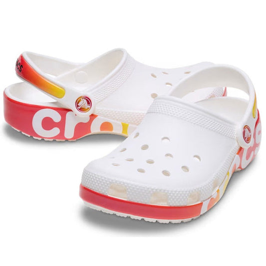 Crocs Kids Classic Clog Reflector White Multi for juniors—breathable clogs with vibrant sole, secure heel strap, and playful colors.  ksnz