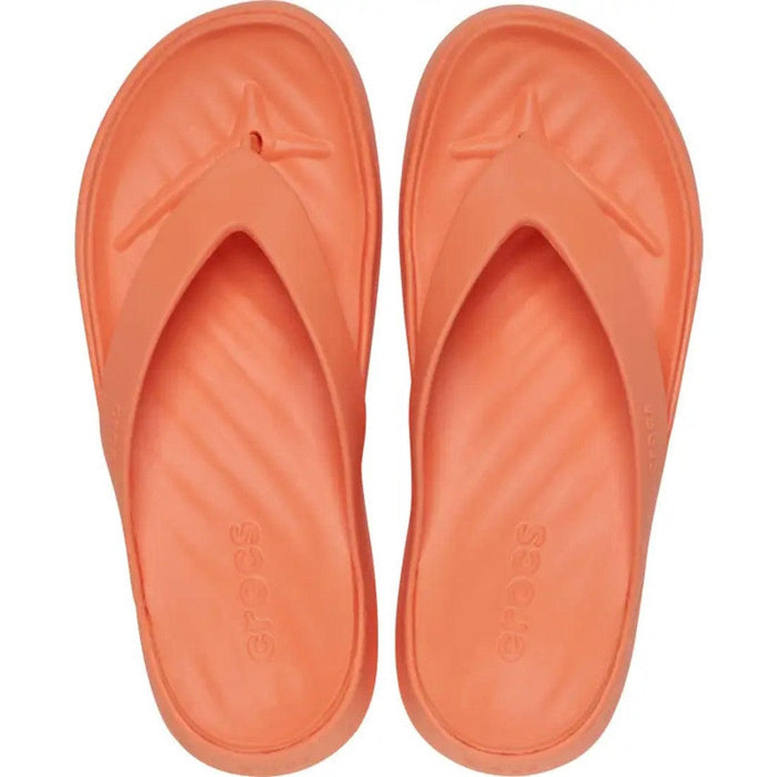 The Crocs - Womens Getaway Strappy Flip Flop Sandal in Sunkissed Orange features textured footbeds, the brand name embossed on each insole, and Free Feel Technology for comfort, shown from above., 35861, 35862, 196265614660, 196265614677, 196265614684, 19
