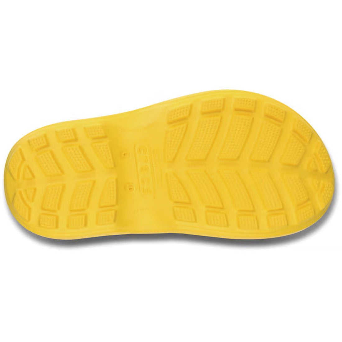 The image shows the bottom view of a yellow rubber sole with textured tread for grip and traction, typical of waterproof styles like the Crocs Kids Handle It Rain Boot Yellow Gumboots., 883503861213, 883503861220, 883503861237, 883503861244, 883503861251,
