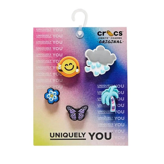 The Crocs Jibbitz 5 Pack - Chill Summer features five fun charms—peace-sign emoji, rain cloud, blue flower, purple butterfly, and blue-and-white palm tree—on rainbow packaging with "UNIQUELY YOU" at the bottom. Perfect to decorate your Crocs!.