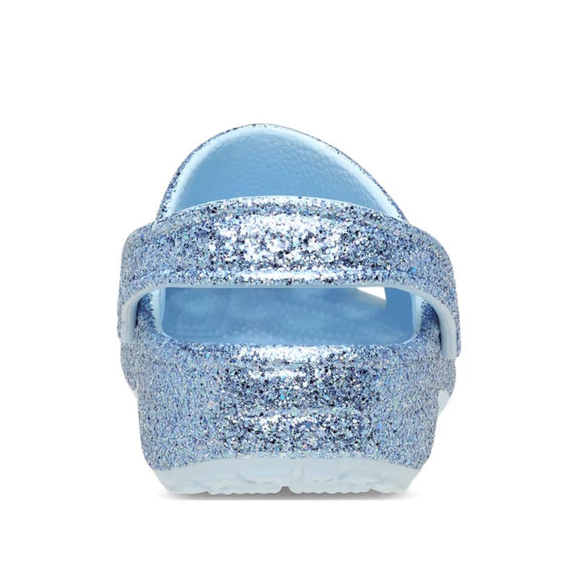 A rear view of the Crocs Kids - Classic Chunky Glitter Clogs in light blue, featuring a glitter-covered finish, textured sole, and back strap—perfect kids' shoes for extra sparkle., 198445287688, 198445287695, 198445287701, 198445287718, 198445287725, 198