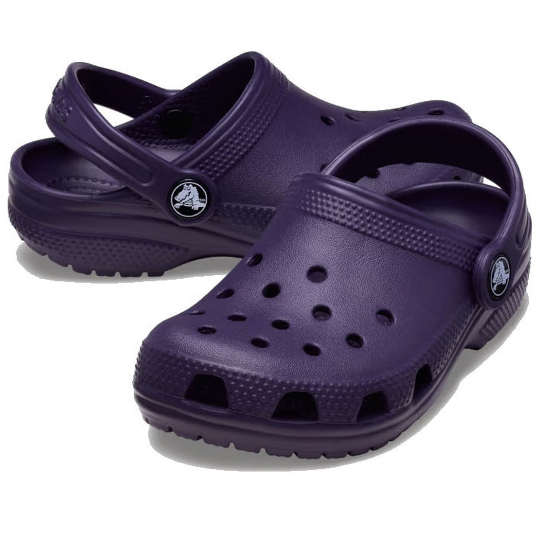Crocs Kids - Toddlers Classic Clog in Dark Iris Purple, with grippy sole, soft foam cushion, breathable holes, and secure back strap.  ksnz