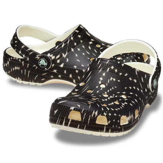 Crocs Kids - Youths Classic Glow Sport Wave Clog K Black Sandal with spotted upper, comfy sole, airy holes, and secure heel strap.  ksnz