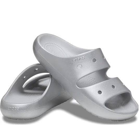 Crocs Metallic Silver Classic Sandal V2 for women, a comfy slide with two wide straps, cozy sole, ventilation holes, and Jibbitz-ready.  ksnz