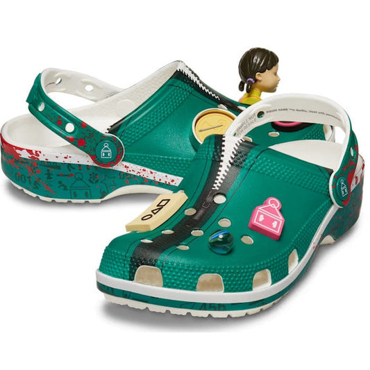 The Crocs - Adults Squid Games Classic Clog in green has comfy soles, sling-back strap, and fun Jibbitz charms kids will love.  ksnz