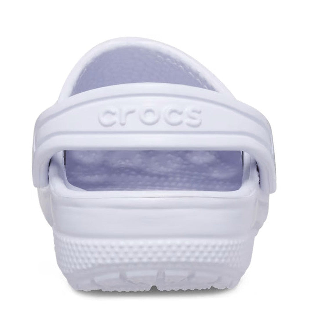 Rear view of a single Crocs Kids Classic Clog in Dreamscape Purple (Junior Youths Sizes), showing the textured sole and heel strap embossed with "crocs"., 196265549948, 196265549955, 196265549962, 196265549979, 196265549986, 196265549993, 196265550104, 19