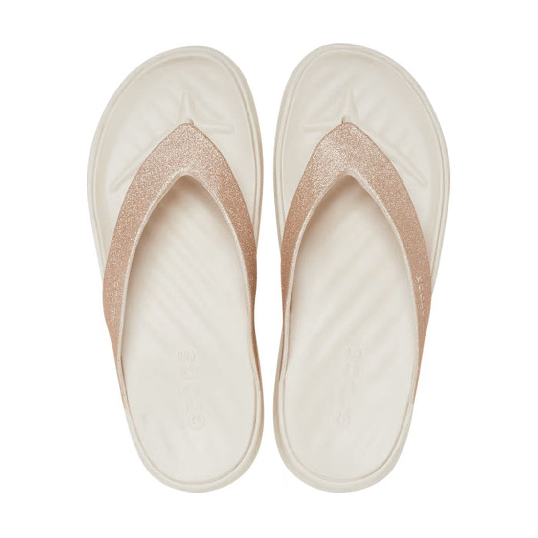 The Crocs Womens Getaway Glitter Strappy Flip Flop Sandals in Stucco feature gold straps and Free Feel Technology for all-day comfort, shown from above on a white background. Part of the Crocs Getaway Collection., 41764, 196265541591, 196265541607, 196265
