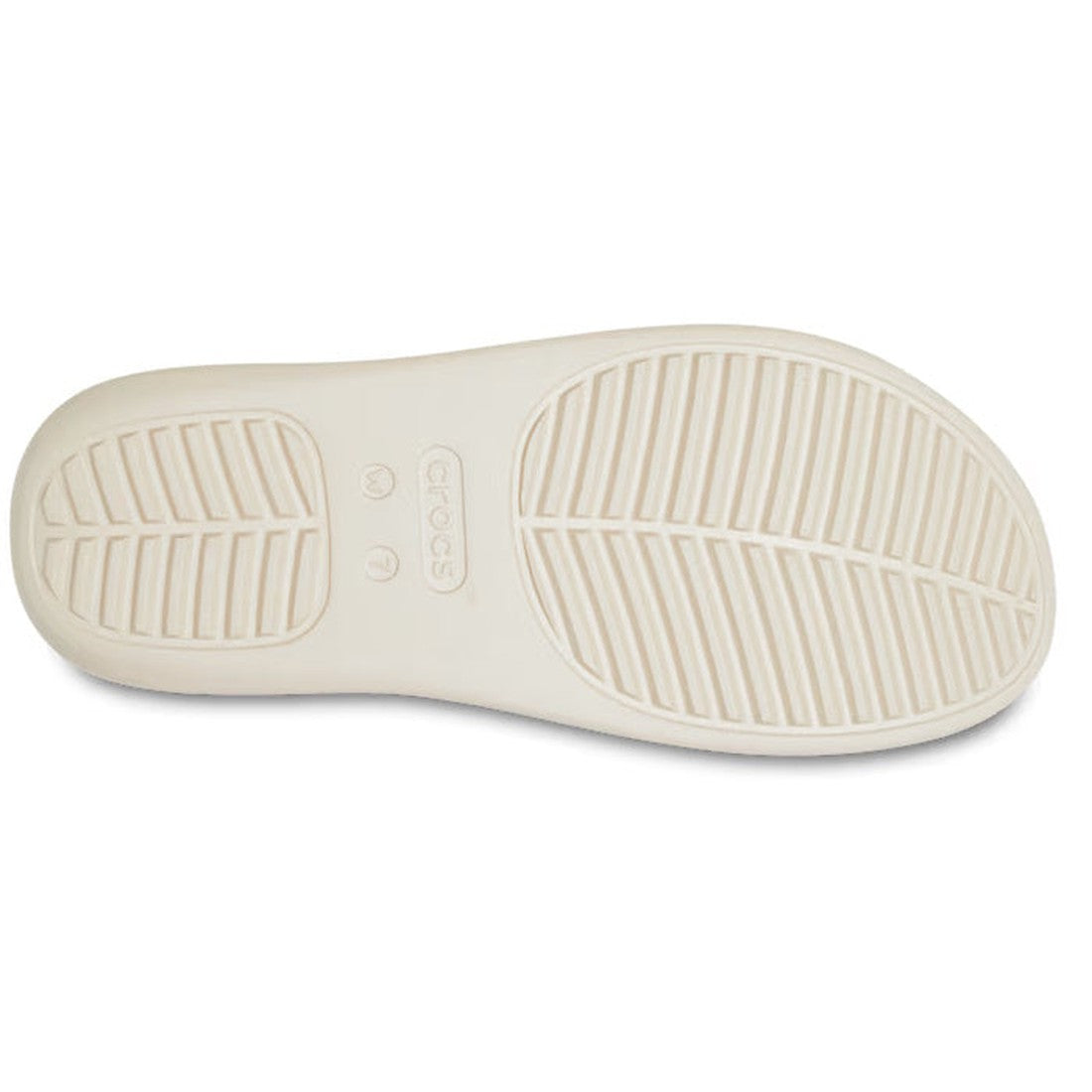 Beige sole of the Crocs - Womens Getaway Strappy Slide Sandal Stucco Bone shown from below, with a textured tread for grip and "Crocs" embossed in the center., 39578, 196265540792, 196265540808, 196265540815, 196265540822, 196265540754, 196265540761