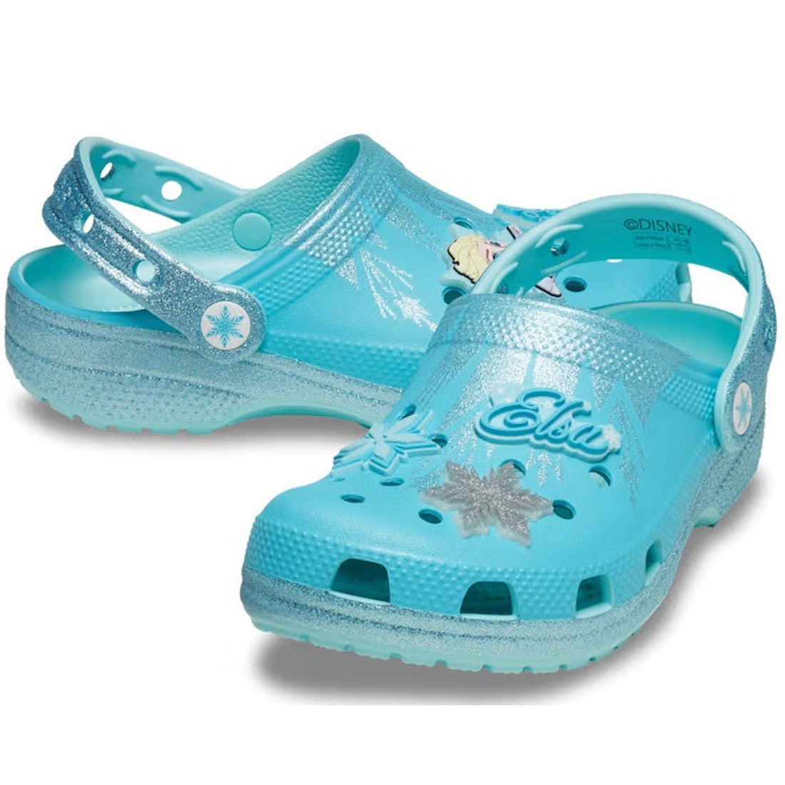 Crocs Kids - Classic Clog Disney Frozen Elsa is a light blue slip-on clog with glitter snowflakes, Frozen charms, and secure back strap.  ksnz