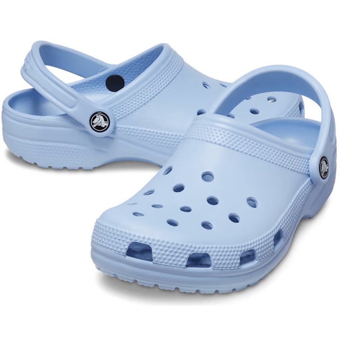 The Crocs - Classic Clog Blue Calcite Adults features ventilation holes on top and adjustable heel straps, shown in light blue on a white background.