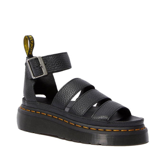 Dr Martens Clarissa II Quad Platform Sandal in black, featuring three thick straps, an adjustable buckled ankle strap, and yellow stitching around the milled Nappa leather sole.