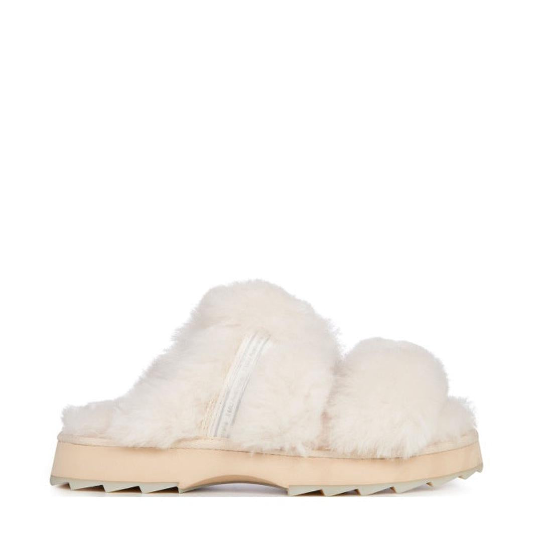 EMU NZ Women’s Wobbegong Natural Sheepskin Scuff Slipper in cream with cozy, thick crossover straps and a safe ridged sole for home comfort.  ksnz