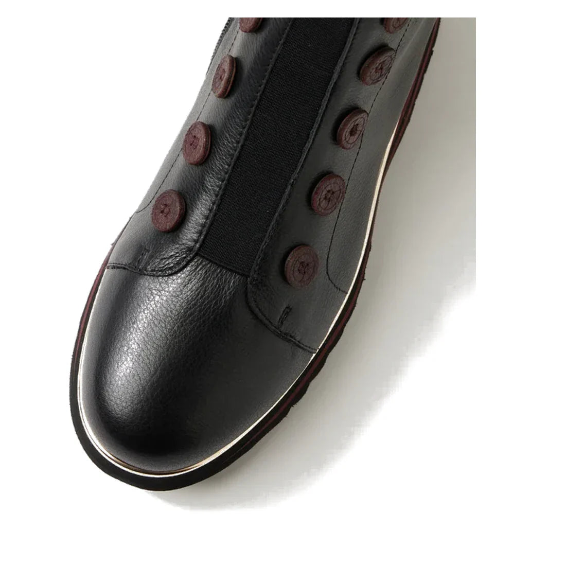Close-up of the Django & Juliette Elrick Black Burgundy Leather Boot, featuring a rounded toe, decorative buttons along the sides, and a thin white stripe on the sole edge. This stylish women's boot is shown against a white background., 51075, 44347543517