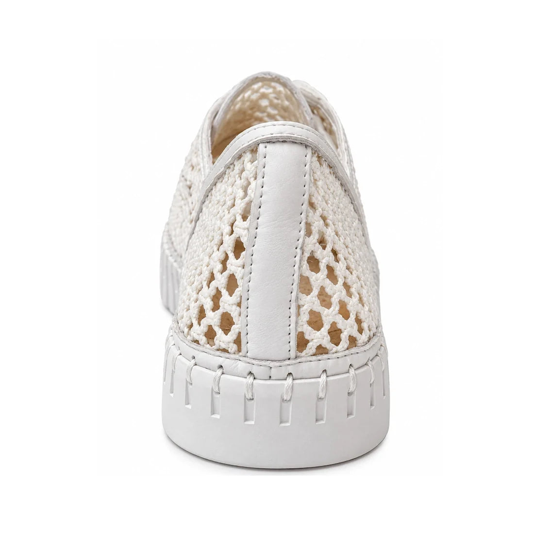 A close-up rear view of Django & Juliete Hamburger White Syn Raffia Leather Sneakers, featuring a woven mesh texture and solid white sole, set against a plain white background.