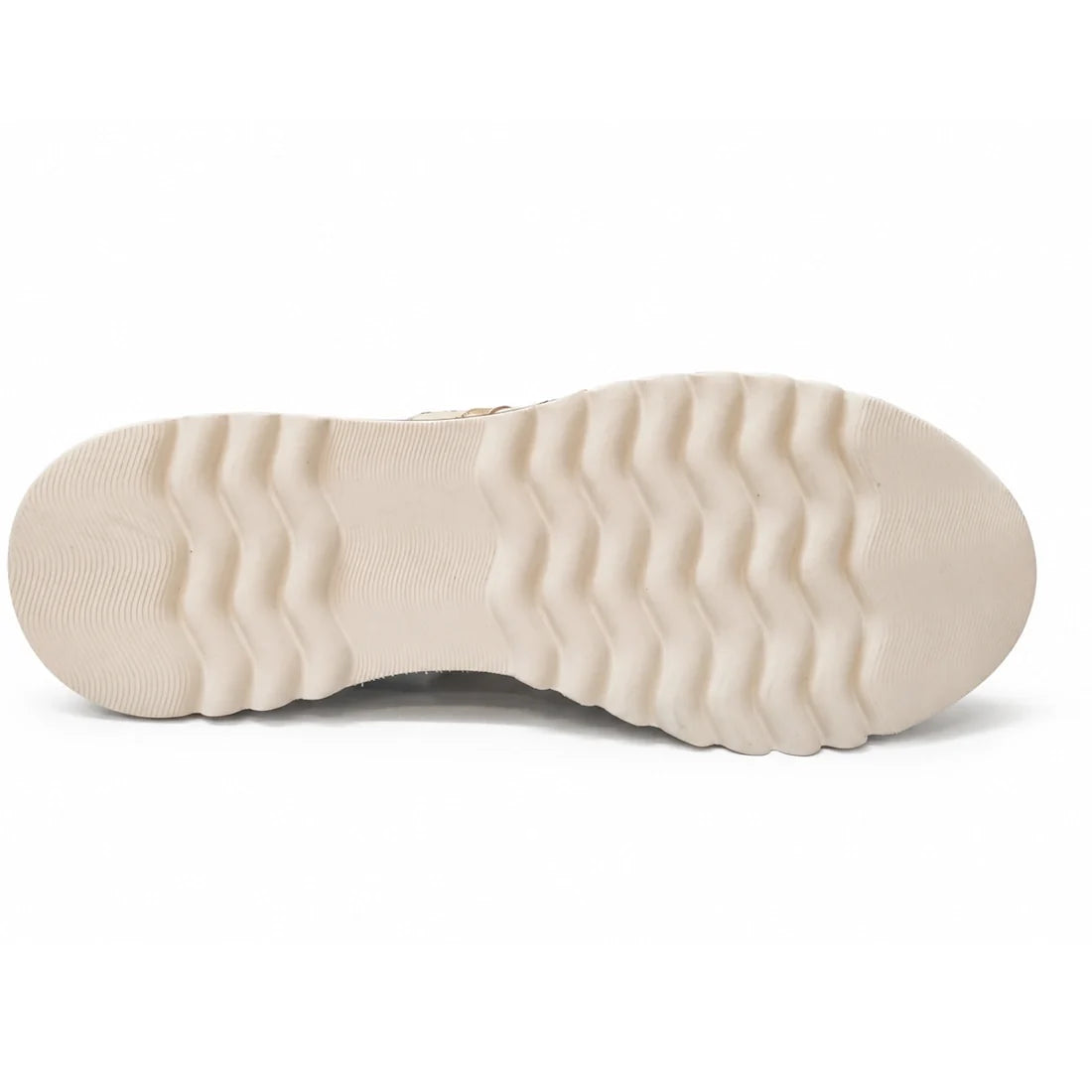 Beige, wavy-textured chunky sole of the Django & Juliette Eminta Platform Shoe Sheer Leather Black Milk Lace Up viewed from below, showing a non-slip tread with multiple horizontal ridges.