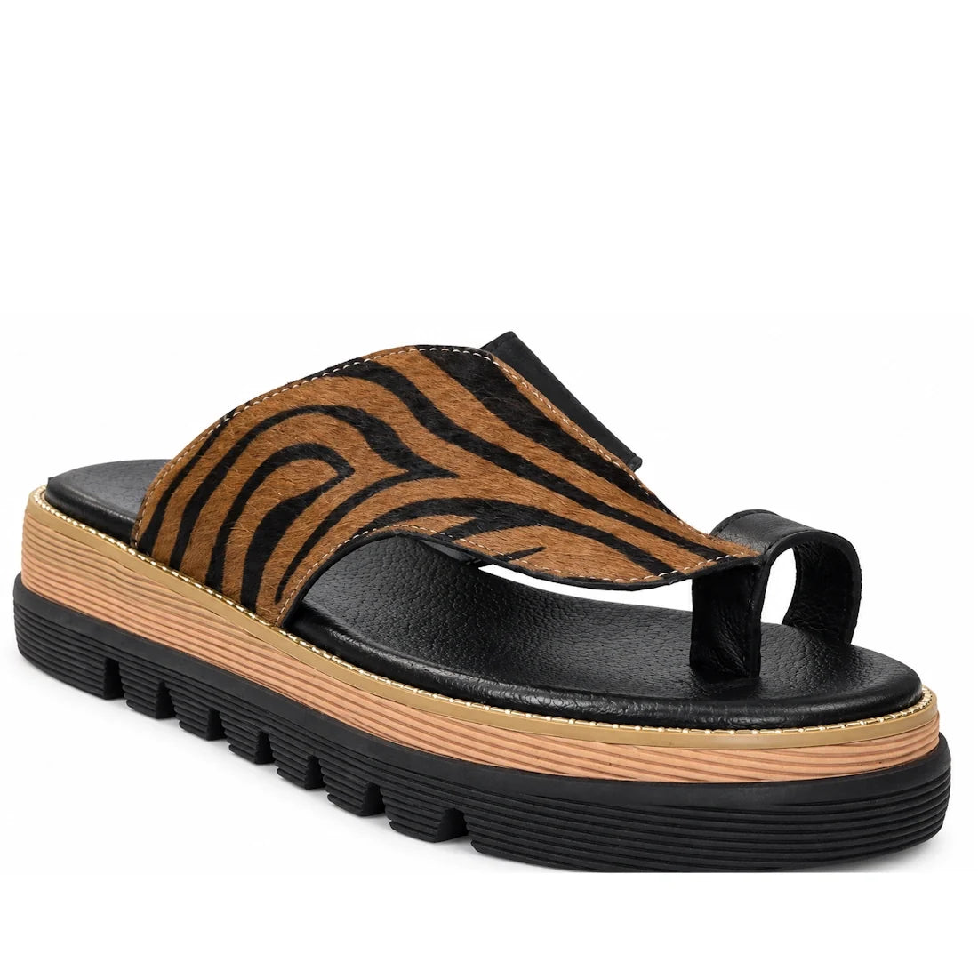 Step out in style with the Django & Juliette Shuua Platform Flip Flop Black Tan Zebra, featuring a black textured sole, tan midsole, and a chic brown and black zebra-striped leather upper with toe loop.